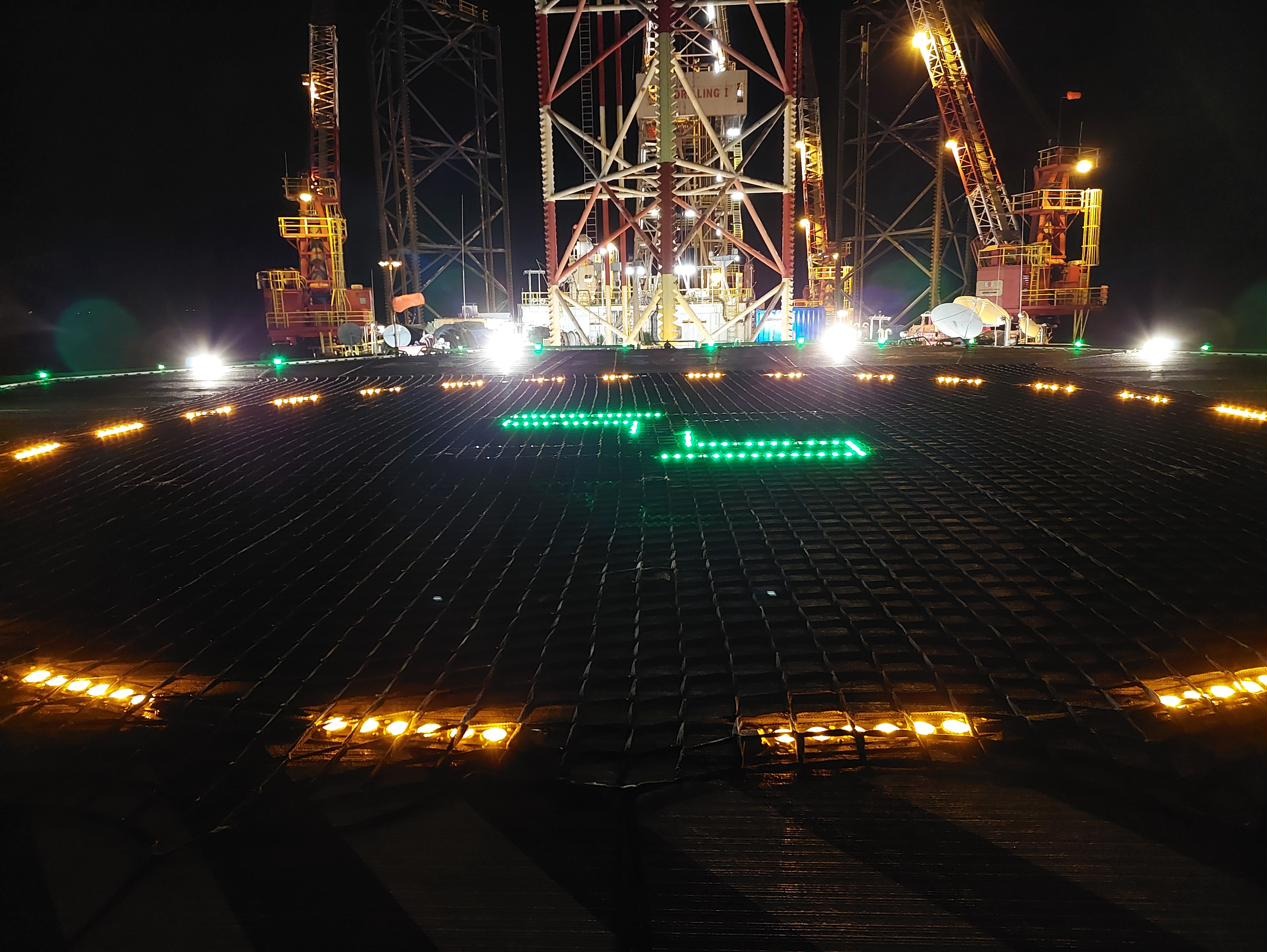 Helideck perimeter and touchdown lighting at night
